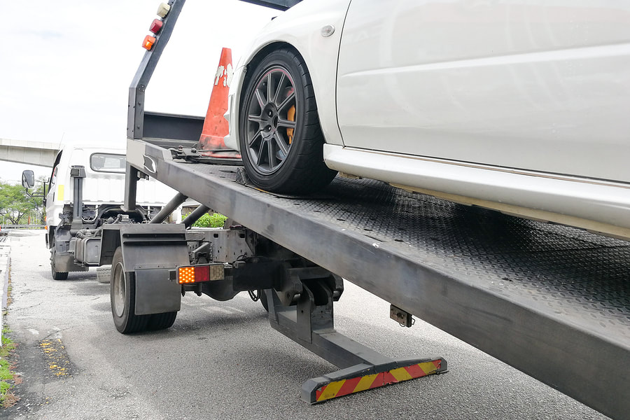 Love Towing Ogden service truck arriving to help a driver locked out of their car in Ogden.